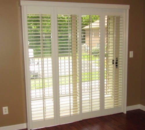 Plantation shutters on a sliding door